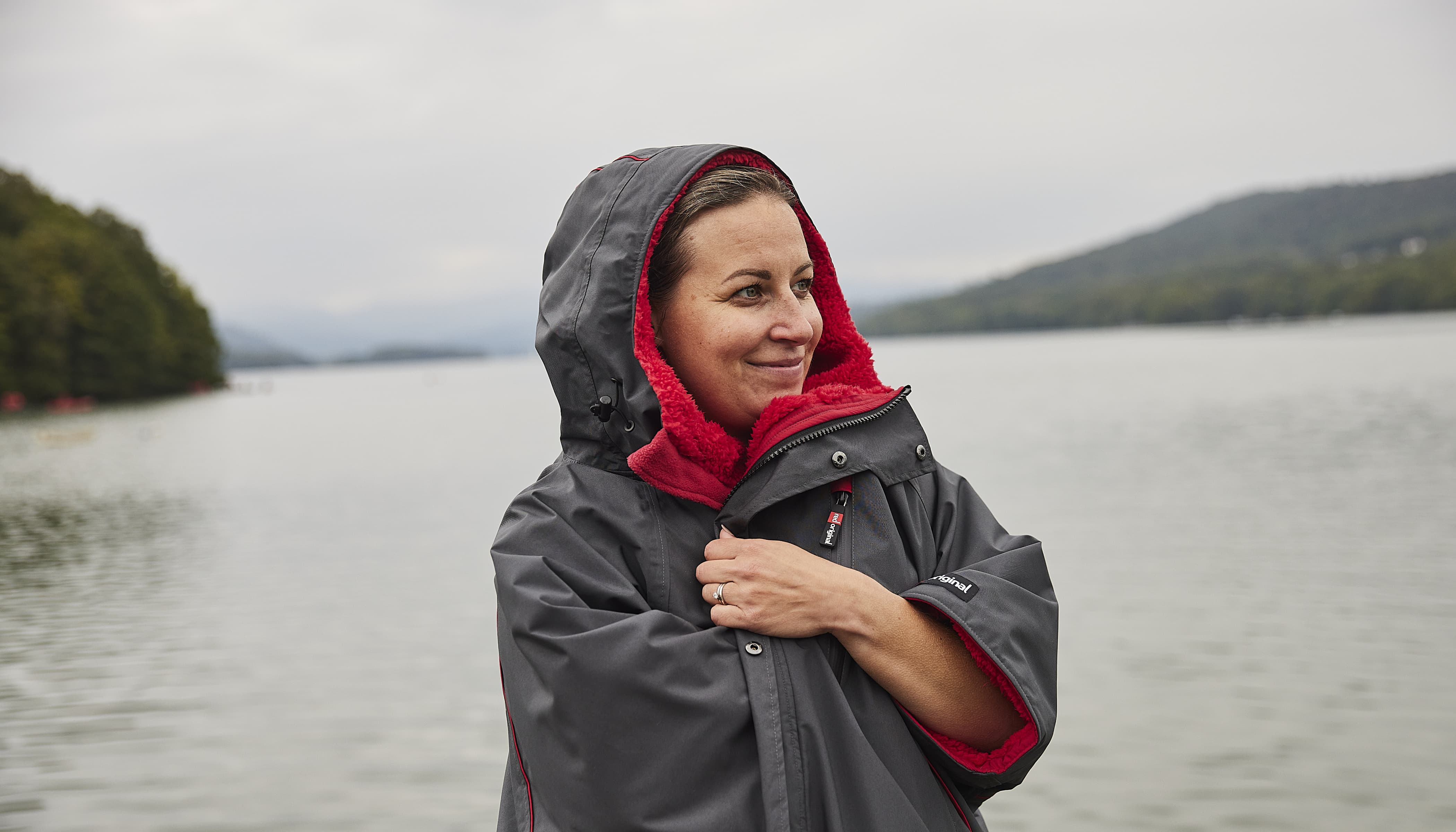 woman wearing black and red red pro change robe