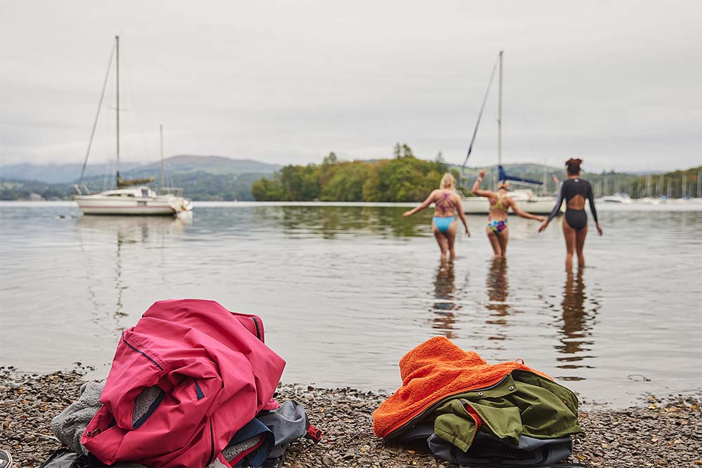 Three women going cold water swimming 