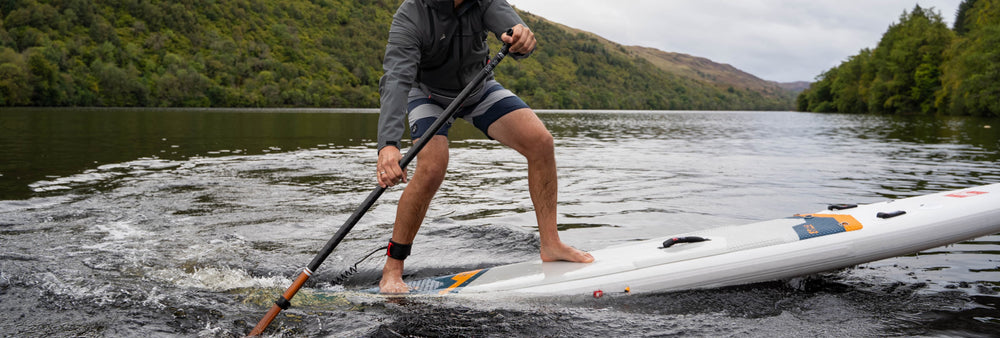 close up of man on paddleboard