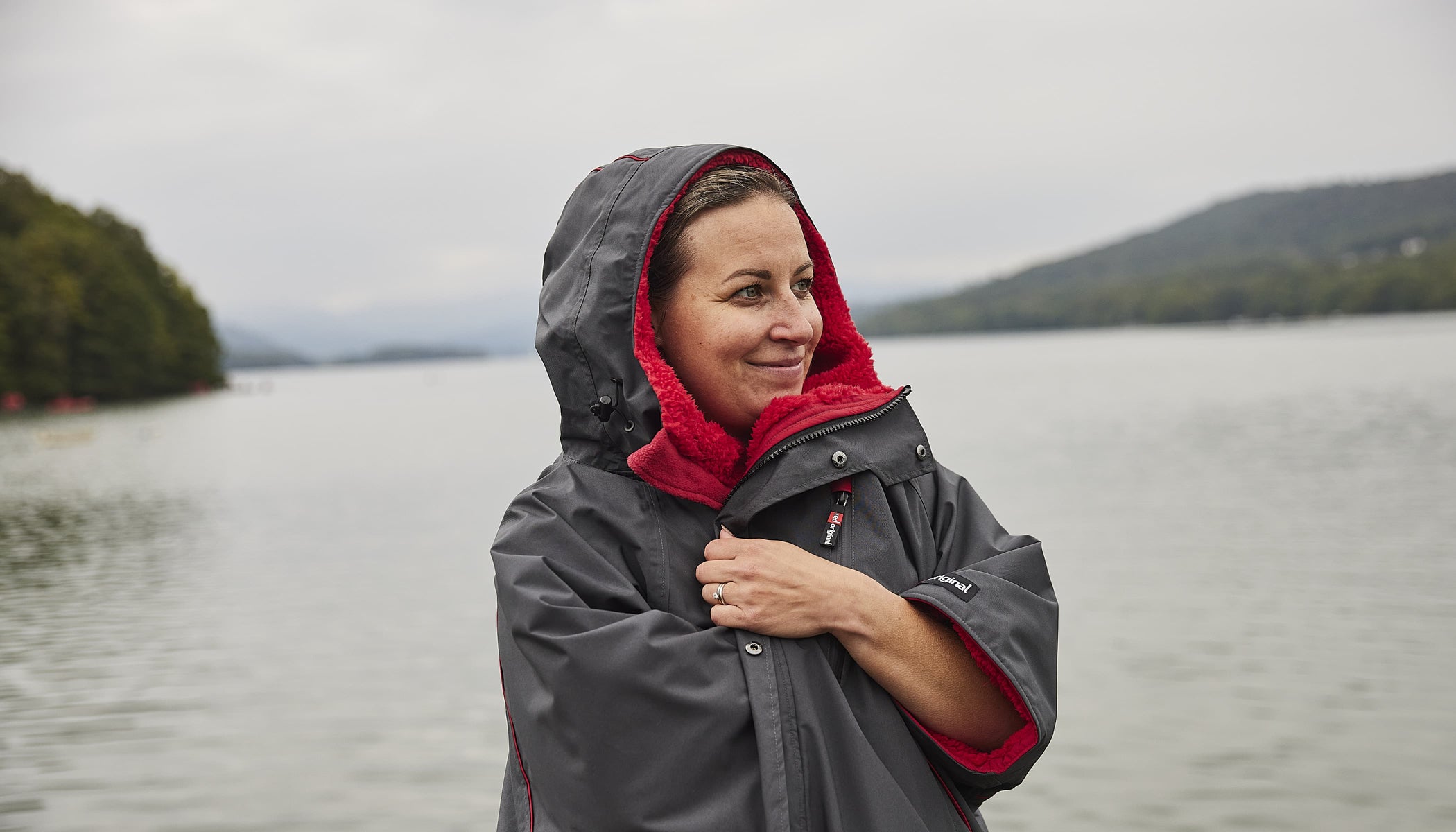 woman wearing black and red red pro change robe