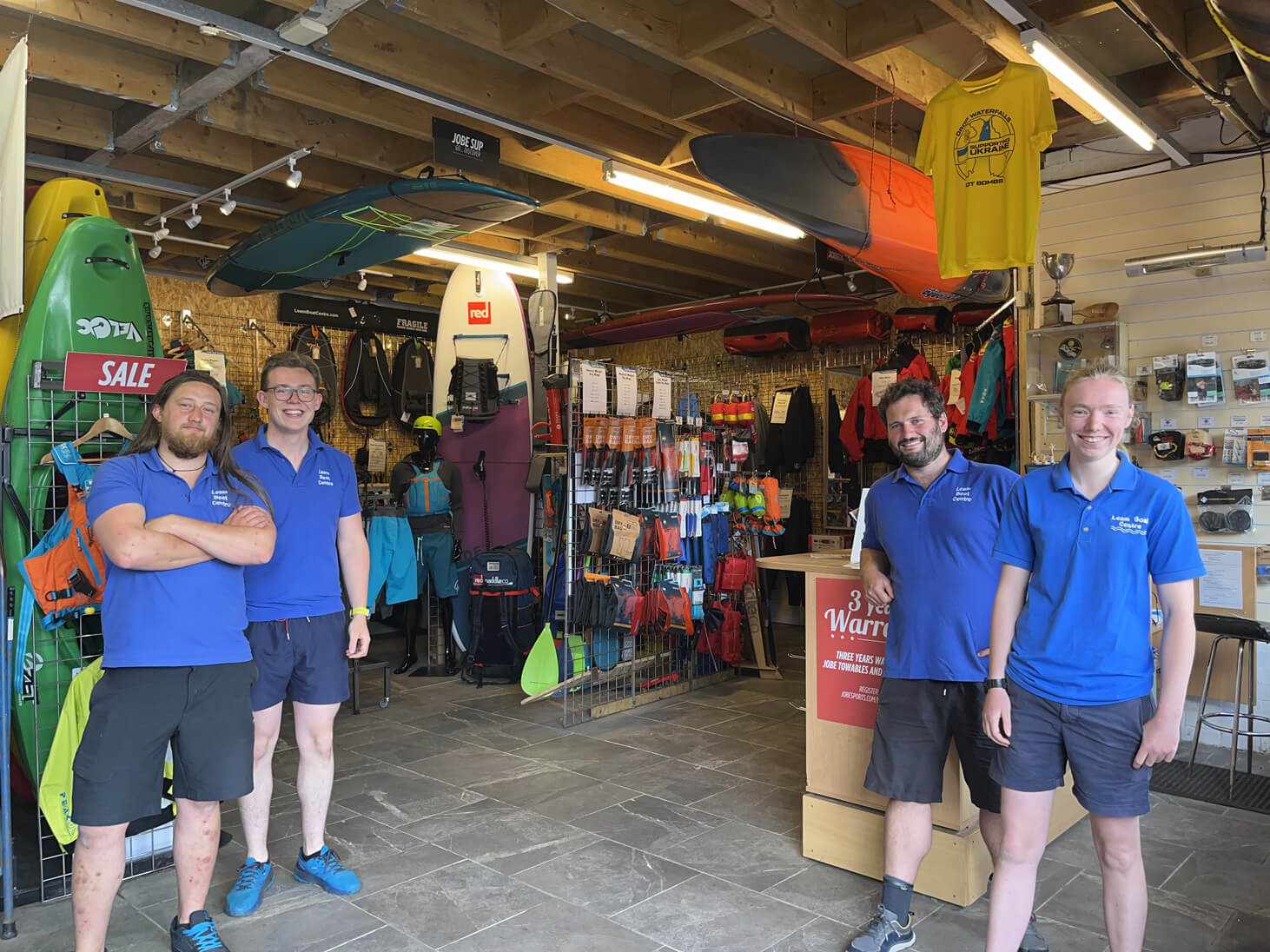 Leam Boat Centre Team Standing In Their Shop
