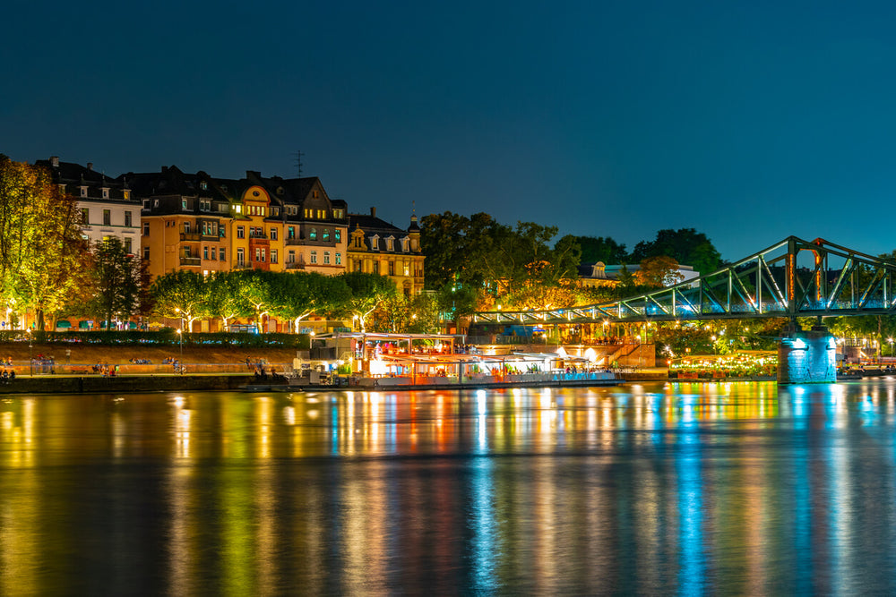 Night view of the Eiserner Steg bridge in Frankfurt