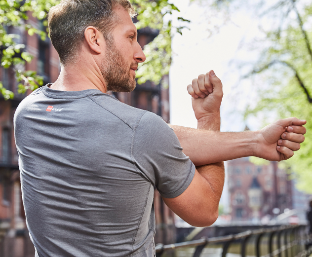 Man warming up for trail running