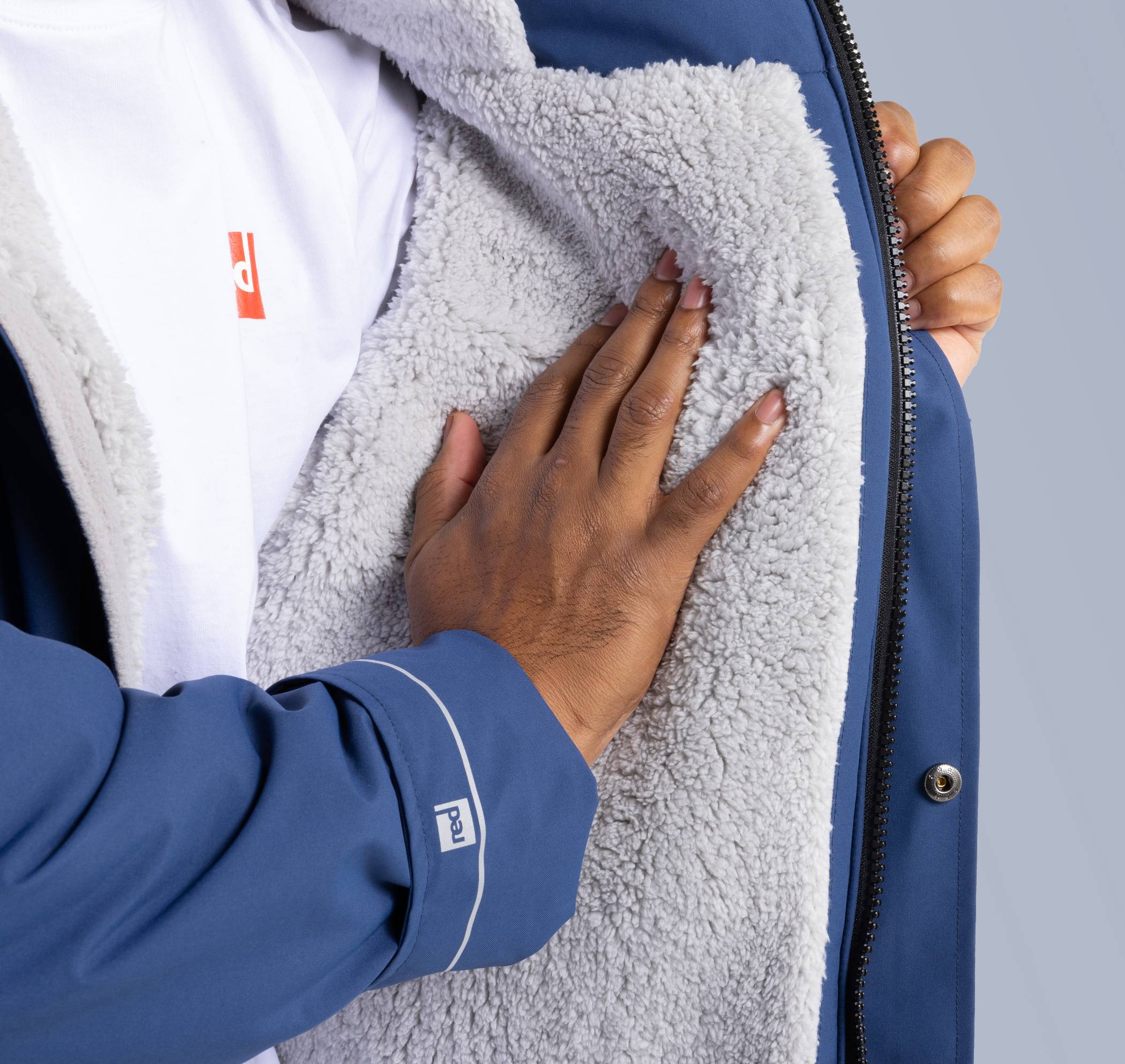 Close up of the inside lining of the Red Equipment Evo Slimline Waterproof Parka Jacket.